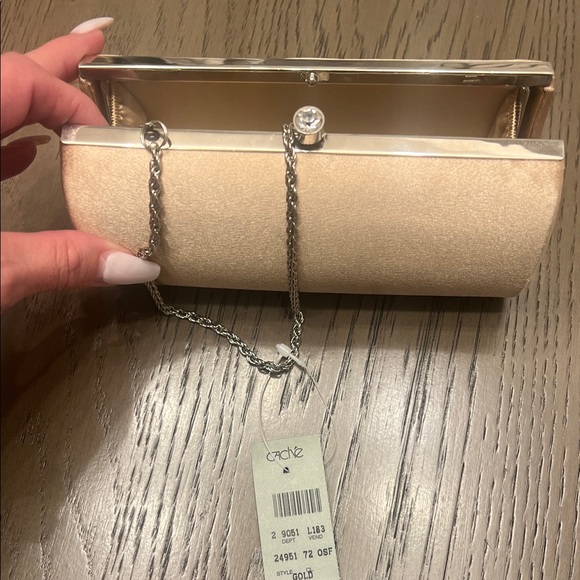 Elegant Tan Clutch with Silver Accents - Picture 2 of 3